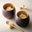 Wooden egg-shaped cup (clear inside, dark brown outside)