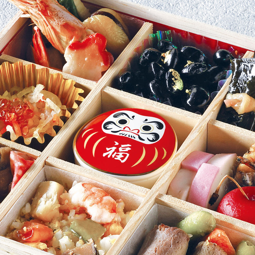 Daruma-shaped lidded delicacy container