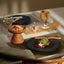 Wooden high-pedestal round bowl